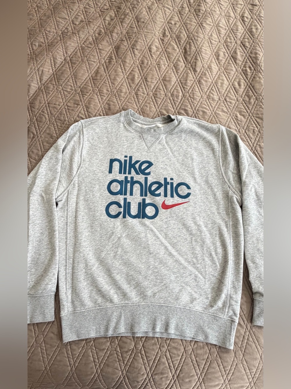 Nike Grey Crewneck Sweatshirt with Blue Logo and Red Swoosh